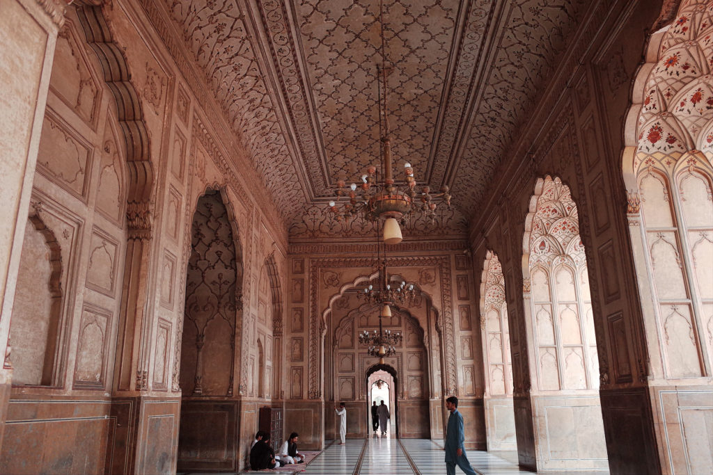 interior embellished with mughal frescoes and carved marble